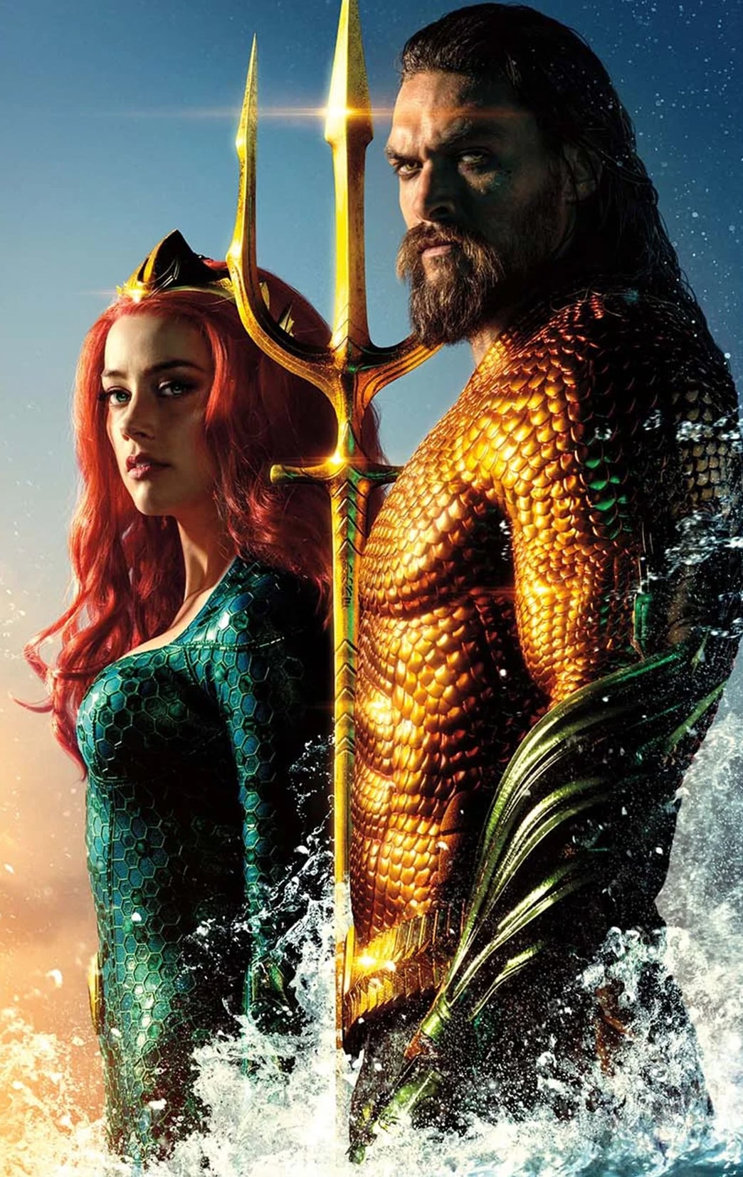 Aquaman movie poster with a man and woman in the water.
