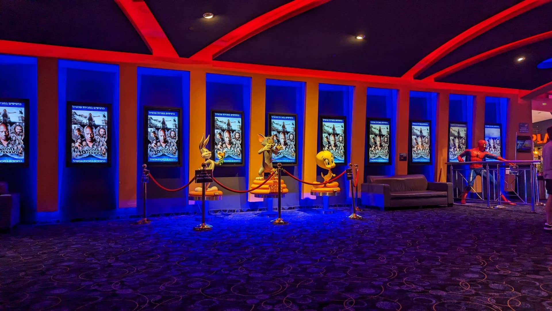 A movie theater with a large number of screens.