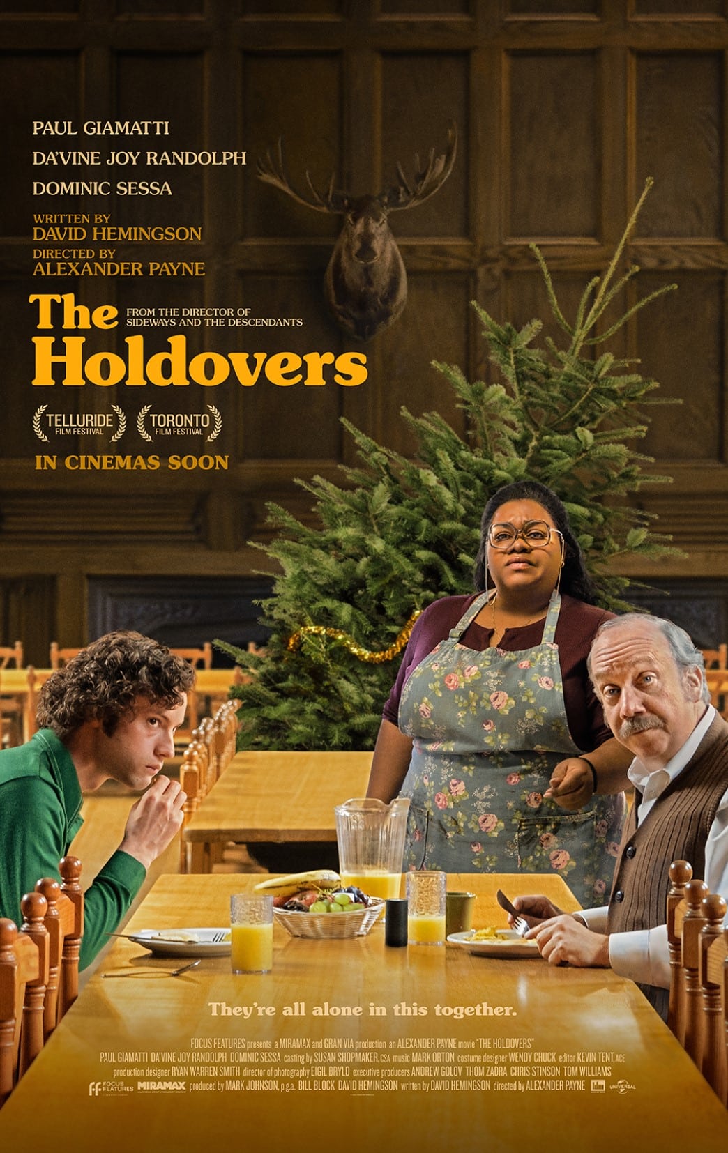 A poster for the holdovers with two people sitting at a table.